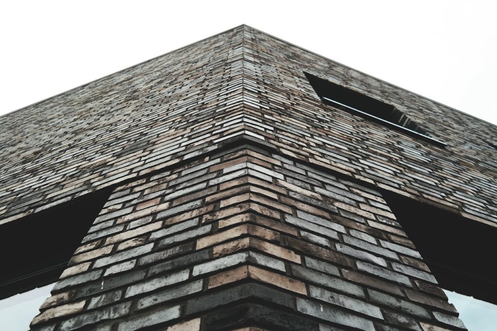 Low Angle Photo of Brown Concrete Building